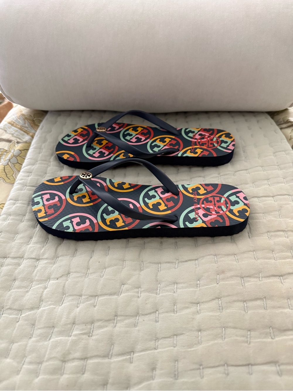 New Tory Burch Navy Strap Flip Flops with Multicolor Logo Print navy base color. - Picture 5 of 10